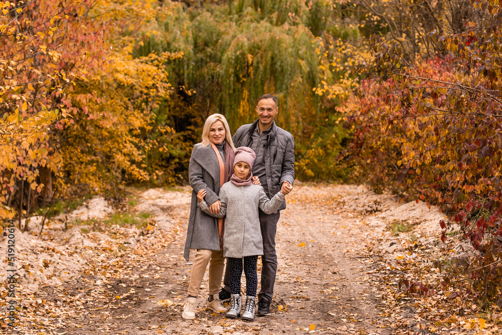 Portrait of family during the autumn Portrait of family during the autumn