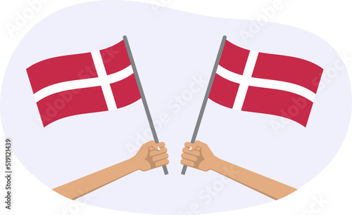Denmark waving flag icon or badge. Hand holding Danish flags. Vector illustration. photo