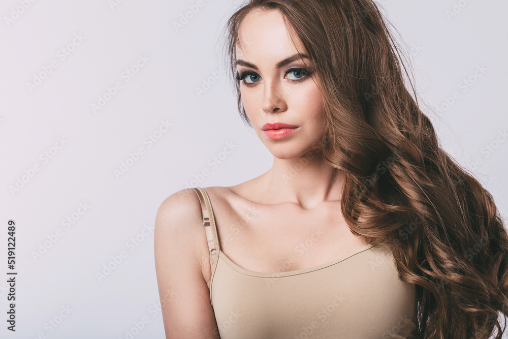 Closeup female portrait, beautiful girl with long hair and make-up in studio. Closeup female portrait, beautiful girl with long hair and make-up in studio.