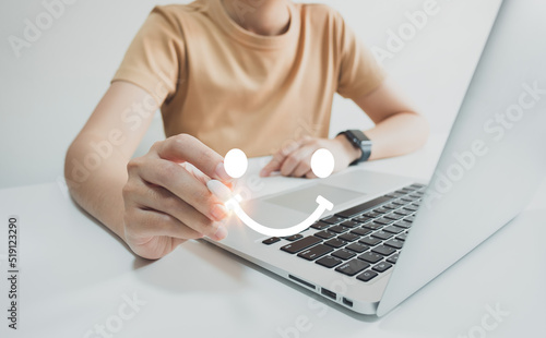 Concept of customer satisfaction and service, businesswoman using laptop to express their opinion, answer and satisfied score, best service, feedback from guest.