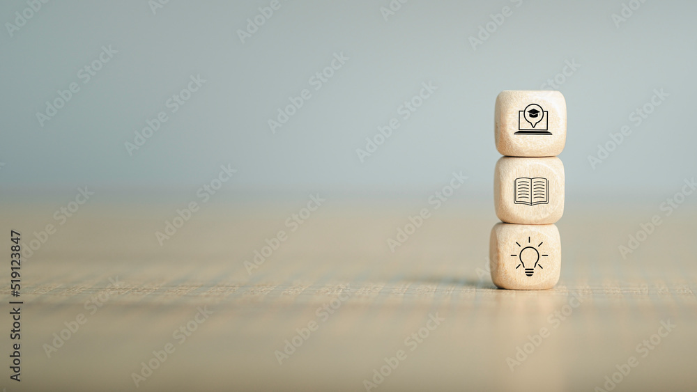 Course education online or e-learning concept. Computer study technology, idea, book, icon on wood block stack with copy space for background or text Course education online or e-learning concept. Computer study technology, idea, book, icon on wood block stack with copy space for background or text