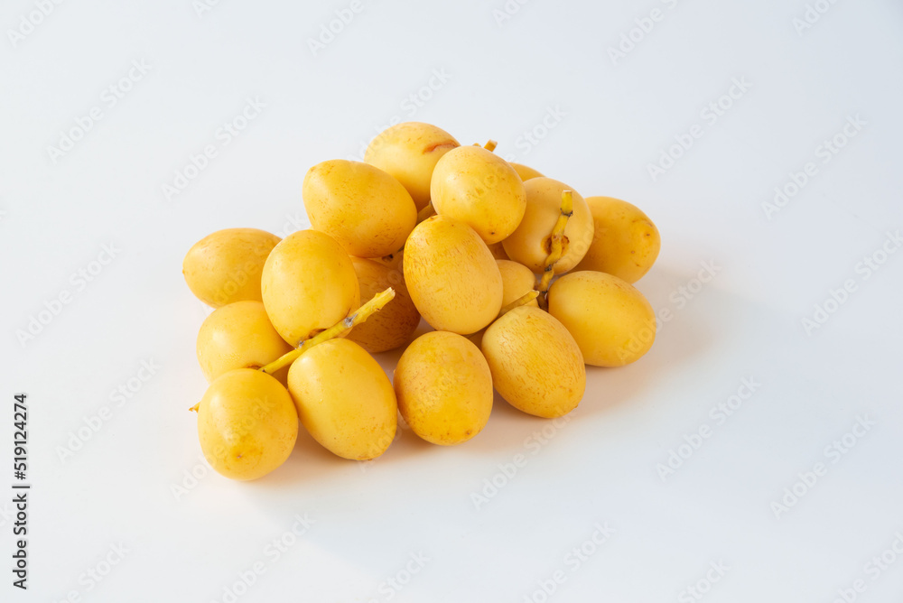 Fresh date palm fruit on white background