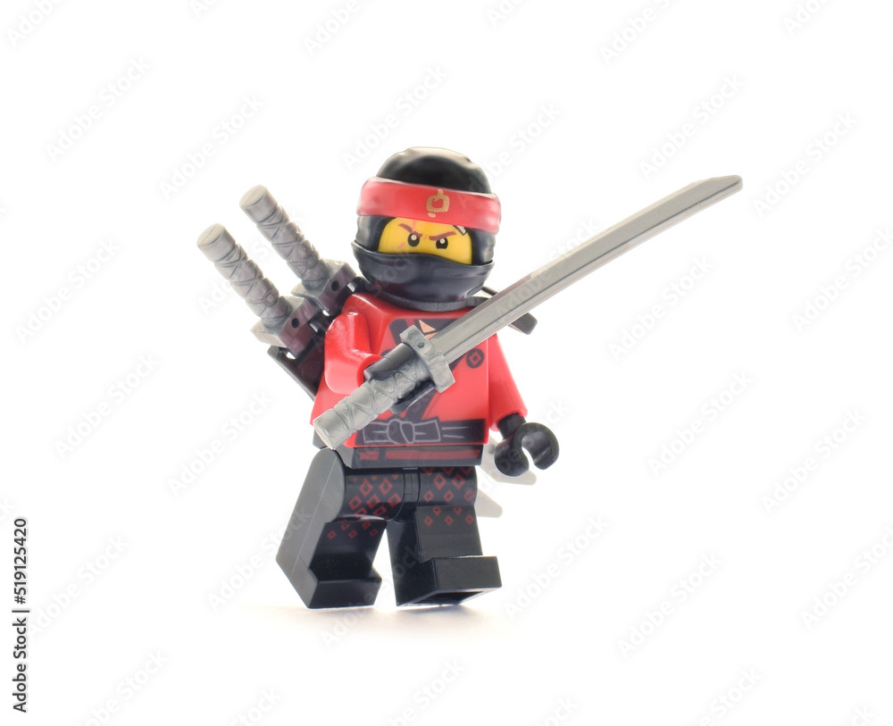 Editorial illustrative image of lego ninjago minifugure Kai red ninja with  sword weapon on white background Stock Photo | Adobe Stock