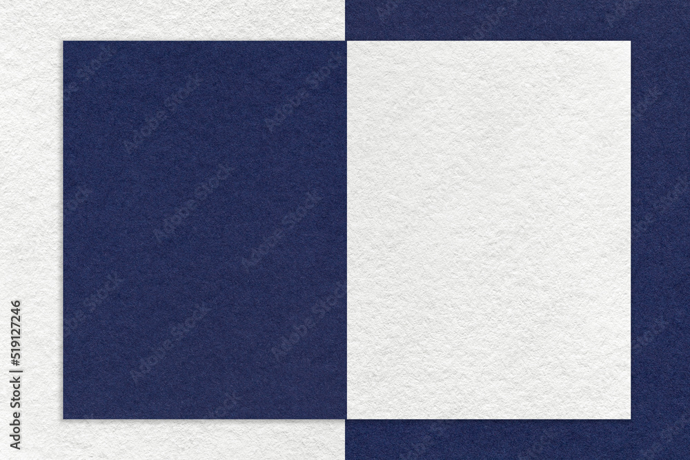 Texture of white and navy blue paper background with geometric shape and pattern. Structure of craft denim cardboard Texture of white and navy blue paper background with geometric shape and pattern. Structure of craft denim cardboard