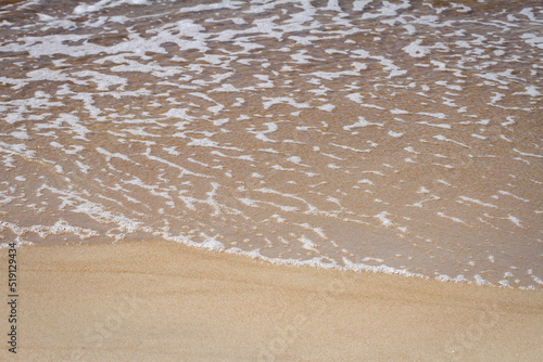 Sand beach and waves