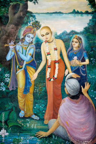 Chaityana Mahaprahbu, a 15th century Vaishnava saint and social reformer- Vaishnava means venerating Vishnu or Krishna (Krishna, playing the flute on the left handside, is one of Vishnu's avatar)