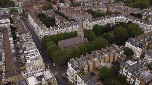 Drone view of St Luke's Earls Court armed with trees and buildings in London. photo