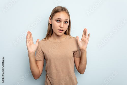 Wallpaper Mural Young caucasian girl isolated on blue background having an idea, inspiration concept. Torontodigital.ca