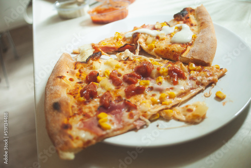 Two pieces of pizza on a plate