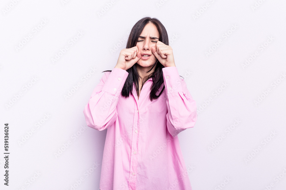 Young caucasian woman isolated on pink background whining and crying disconsolately. Young caucasian woman isolated on pink background whining and crying disconsolately.