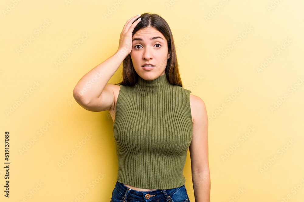 Young caucasian woman isolated on yellow background being shocked, she has remembered important meeting. Young caucasian woman isolated on yellow background being shocked, she has remembered important meeting.