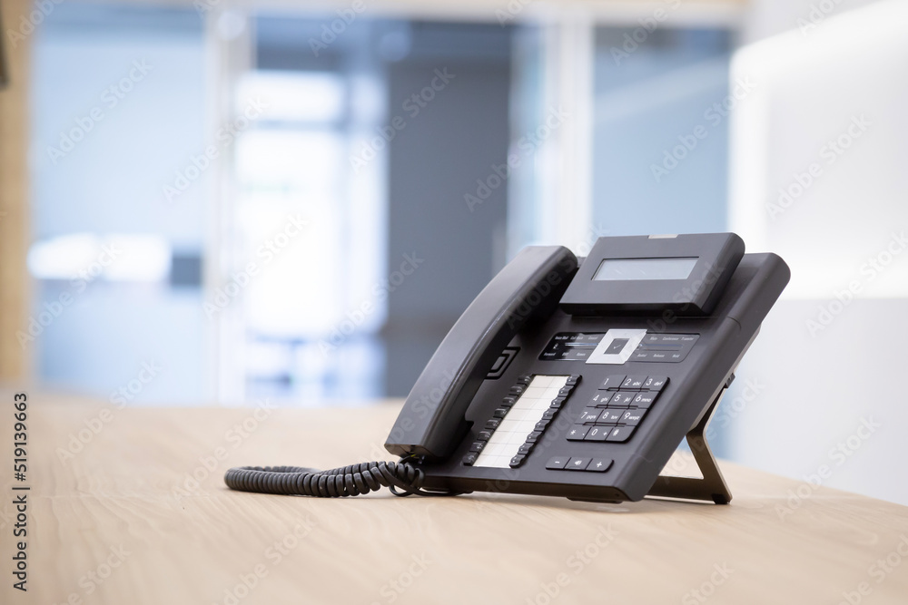 Close up telephone landline at office concept Communication support, call center and customer service help desk.for (call center) concept. Close up telephone landline at office concept Communication support, call center and customer service help desk.for (call center) concept.