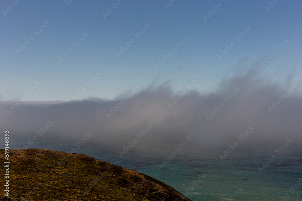 A view on Pacific ocean, cast, rocks and waves