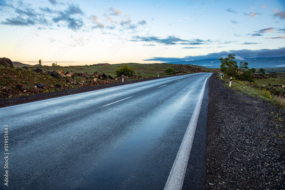 The road curves beautifully in the evening.