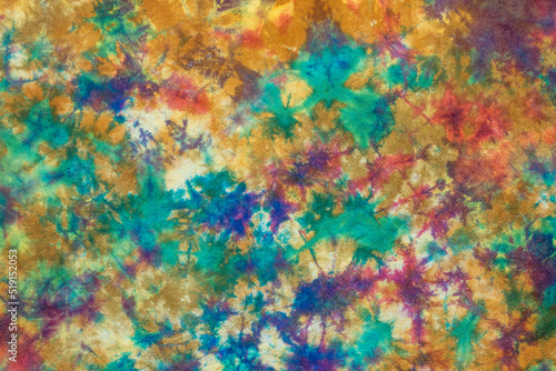 tie dye pattern hand dyed on cotton fabric abstract texture background. © p-fotography