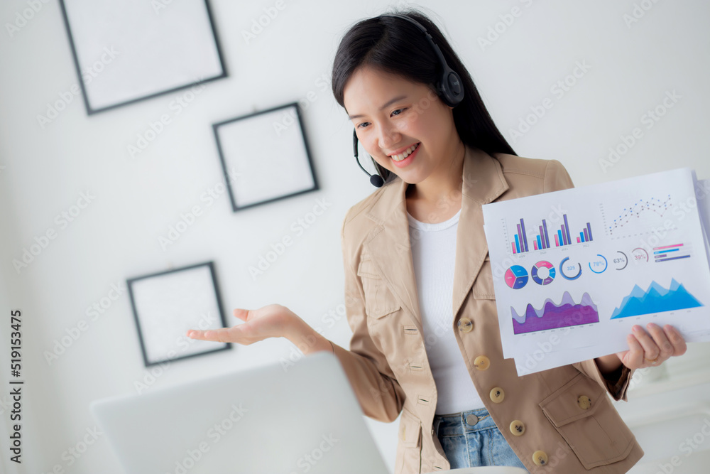 Young asian business woman using laptop computer for video conference online, businesswoman working with video call for meeting and showing graph report for finance, communication concept. Young asian business woman using laptop computer for video conference online, businesswoman working with video call for meeting and showing graph report for finance, communication concept.
