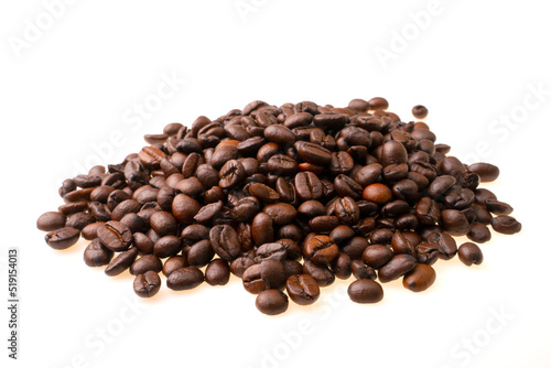 heap of coffee beans on a white background.  soft focus.shallow focus effect.