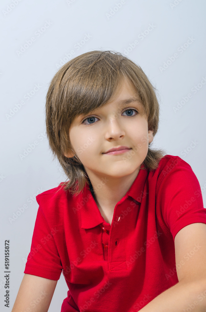 Portrait of cute kid sitting and looking away Portrait of cute kid sitting and looking away
