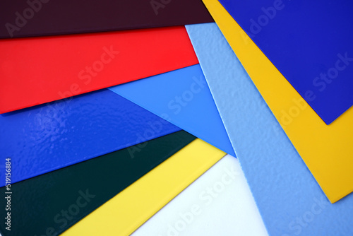 Powder Coatings sample plate. Colorfully painted metal plates on a white background