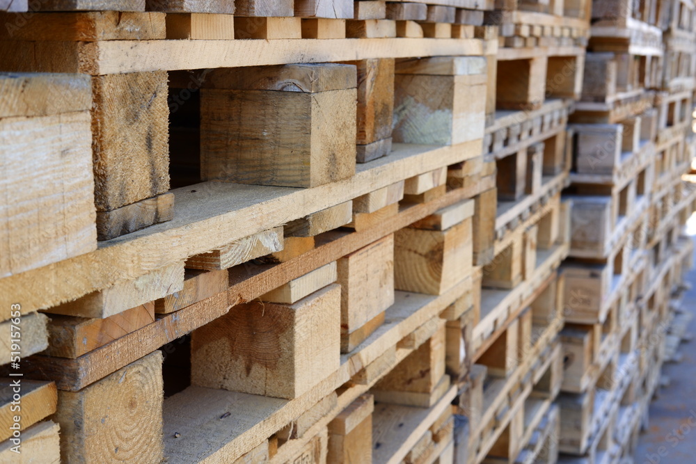 Wooden pallets stacked for use