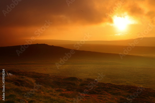 Dramatic Lighting over the Pennine Hills at Sunset, North Yorkshire, UK England. © Colin Ward