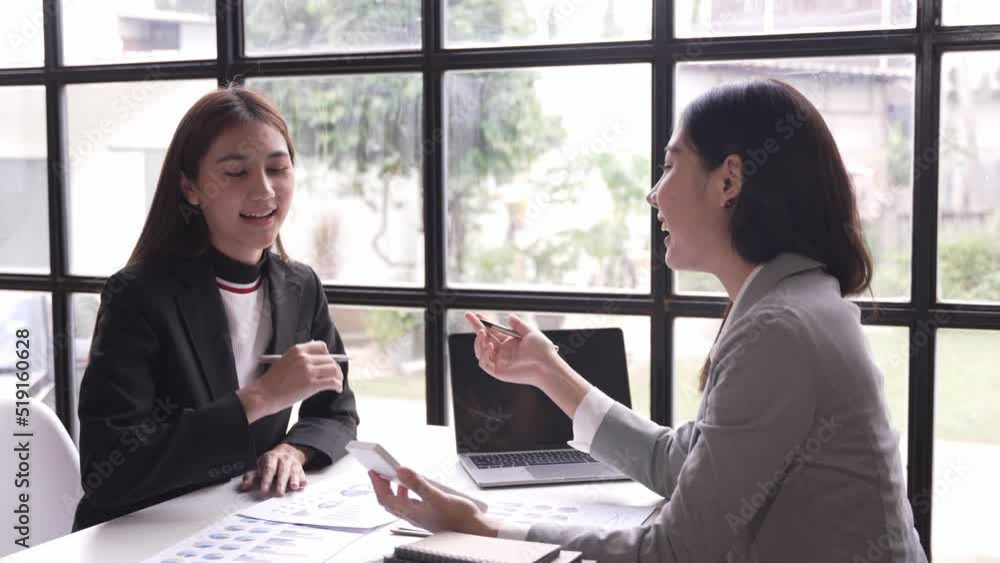 Young colleagues having great business conversations in a modern coworking office. Teamwork concept. Horizontal blurry background. Fireworks. Young colleagues having great business conversations in a modern coworking office. Teamwork concept. Horizontal blurry background. Fireworks.