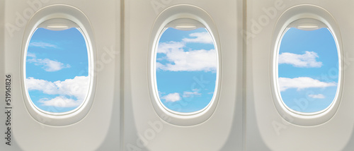 Windows inside airplane through with blue sky for journey