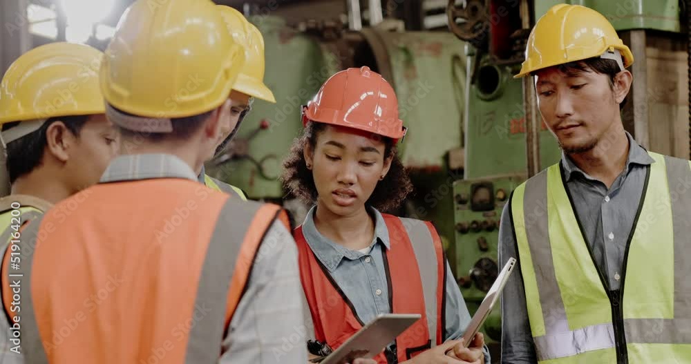 Blue-collar Worker. multi-ethnic team of technician and engineer are checking machinery in operation in industrial plant team work of repair inspector complete maintenance of machine equipment. Blue-collar Worker. multi-ethnic team of technician and engineer are checking machinery in operation in industrial plant team work of repair inspector complete maintenance of machine equipment.
