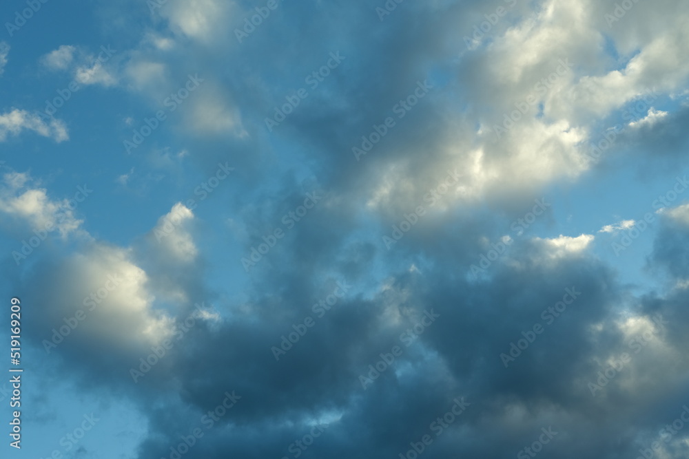 Dark blue evening sky with clouds. Blue hour. Heavenly natural background to overlay on your photos. Dark blue evening sky with clouds. Blue hour. Heavenly natural background to overlay on your photos.