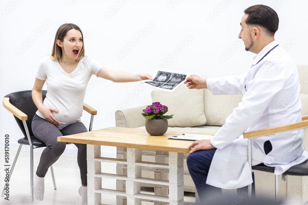 Fototapeta premium Photo of pregnant woman visiting her doctor.