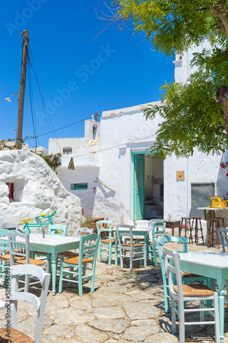 Traditional greek street with tables in Amorgos island, Greece islands