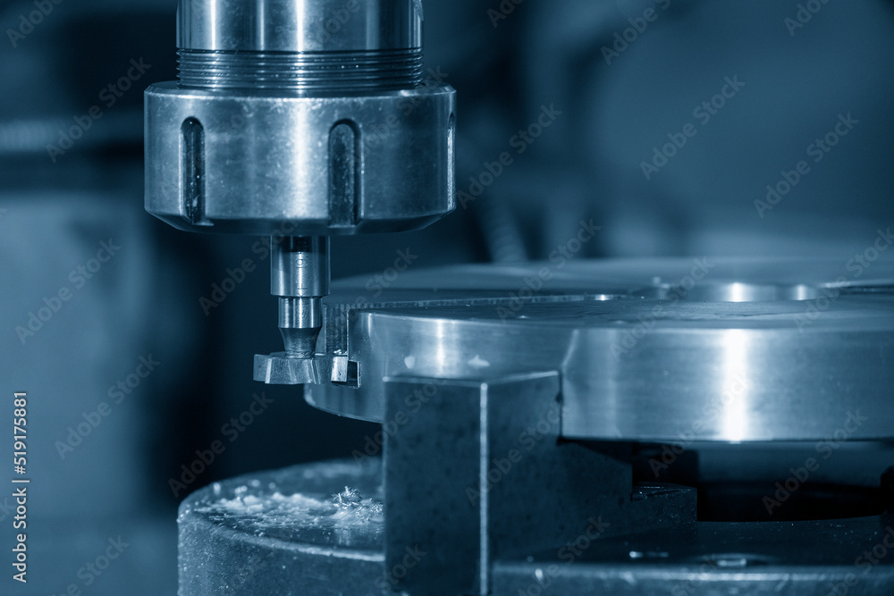 The NC milling machine T-slot cutting the metal parts. The NC milling machine T-slot cutting the metal parts.