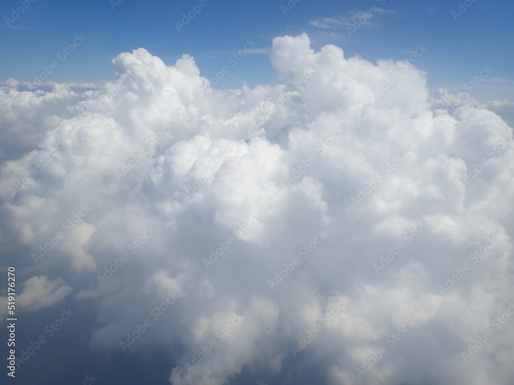 beautiful view over the cloud and blue sky from air plane window beautiful view over the cloud and blue sky from air plane window