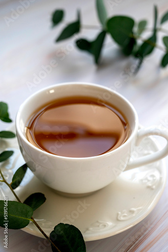 Cup of tea, herabal natural tea. Morning warm tea with eucalyptus leaves