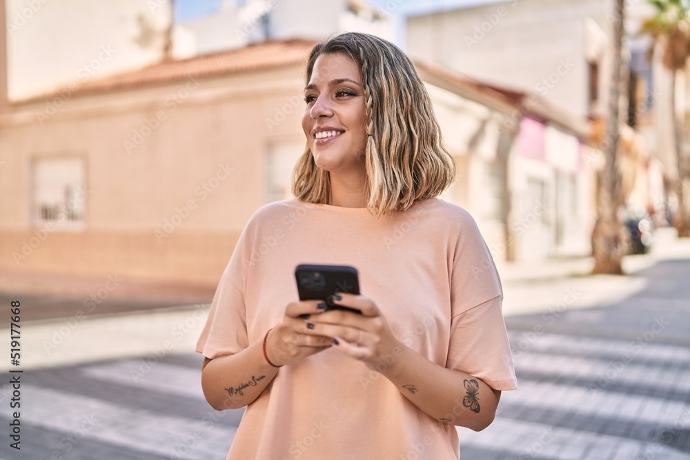 Young hispanic woman smiling confident using smartphone at street Young hispanic woman smiling confident using smartphone at street