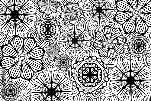 Black and white texture with mandala flowers pattern. Monochrome colors. Hand drawn mandala. Round elements. white background. For decoration on fabric or for wall poster printing.