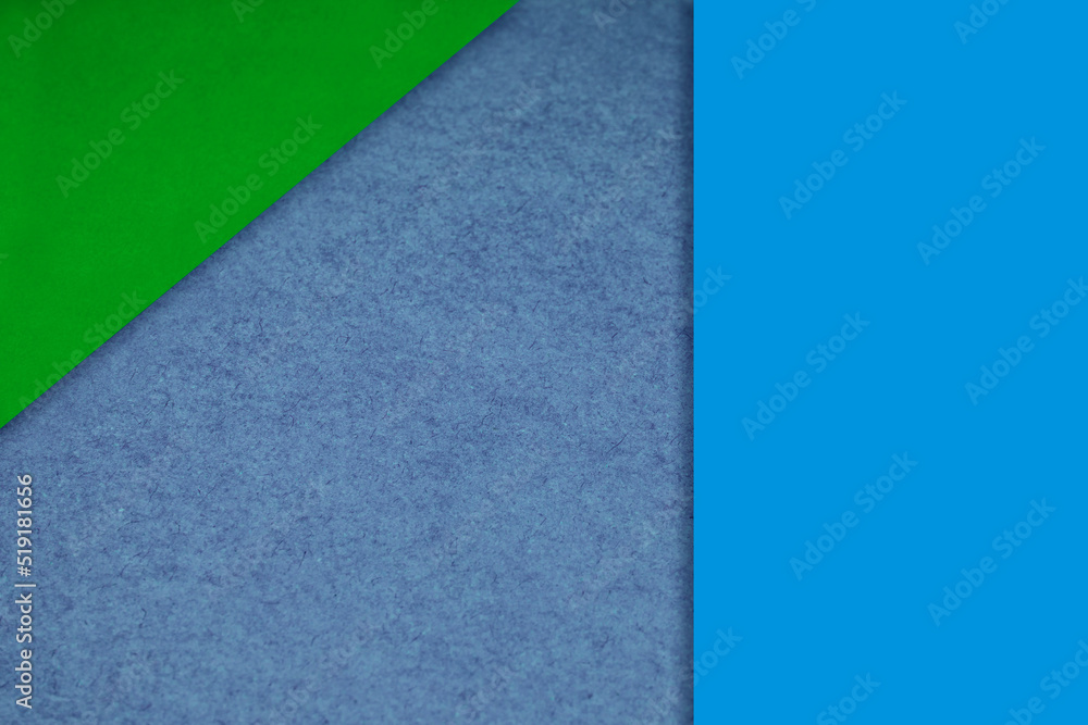 Textured and plain green grey blue sheet papers forming two triangles and vertical blank rectangle for creative cover designing Textured and plain green grey blue sheet papers forming two triangles and vertical blank rectangle for creative cover designing