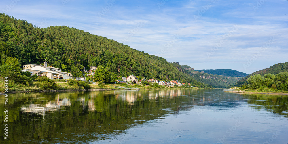 View from a steamboat on the shores of the Elbe in the National Park of Saxon Switzerland.