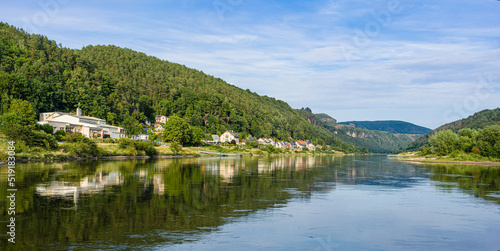 View from a steamboat on the shores of the Elbe in the National Park of Saxon Switzerland.