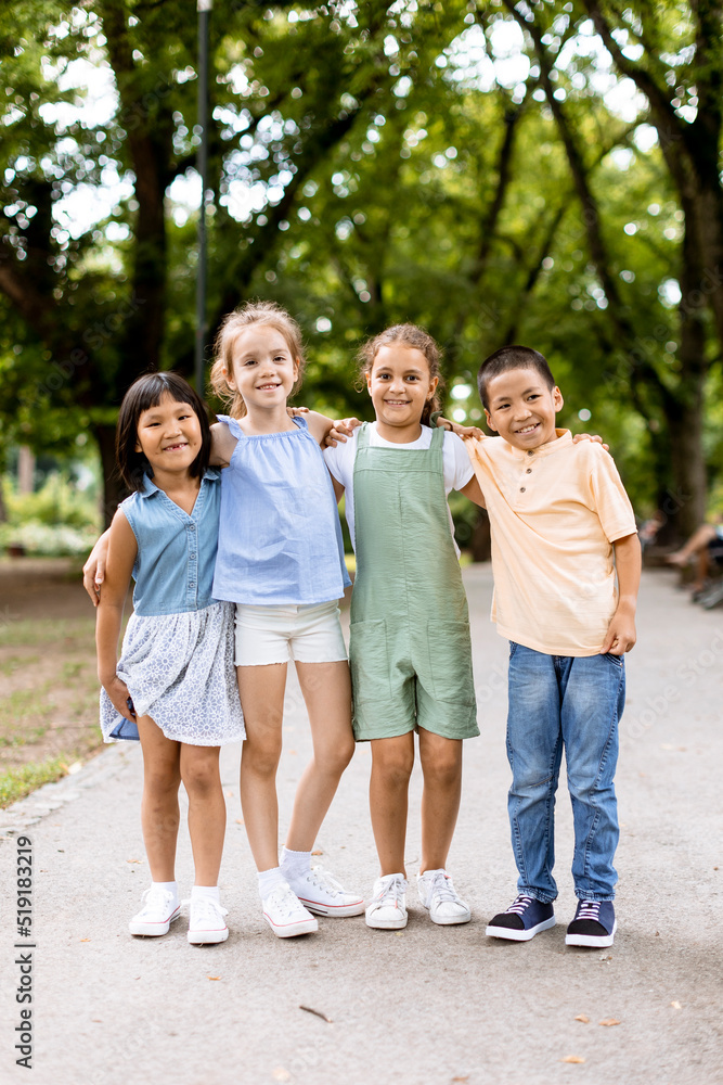 Group of asian and caucasian kids having fun in the park Group of asian and caucasian kids having fun in the park
