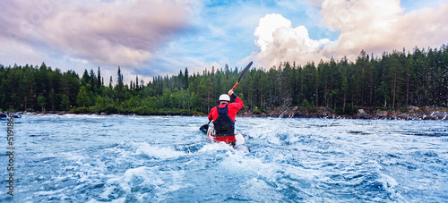 Banner whitewater kayaking, extreme water sport rafting. Man in kayak sails mountain river sunny day