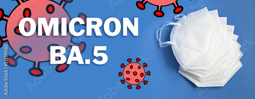 Protection masks ffp2 to prevent COVID-19 infection on blue background and text Omicron BA.5 with coronavirus. Concept of protection from new variant BA.5 of Virus SARS-CoV-2. Panoramic image.