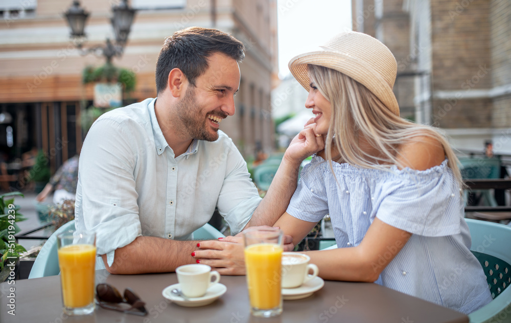 Romantic couple in the cafe. Dating, love, relationships Romantic couple in the cafe. Dating, love, relationships