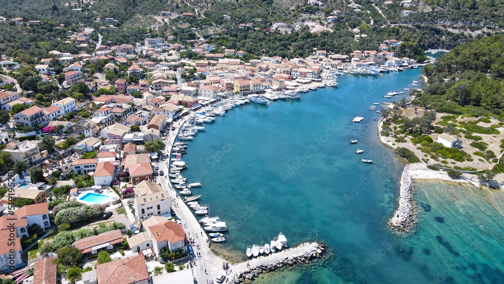 Scenic ionian islands of Greece - Paxos. view of Gaios Town aerial top view drone. Aerial drone photo of iconic port of Gaios a natural fjord bay ideal for safe anchorage in island of Paxos