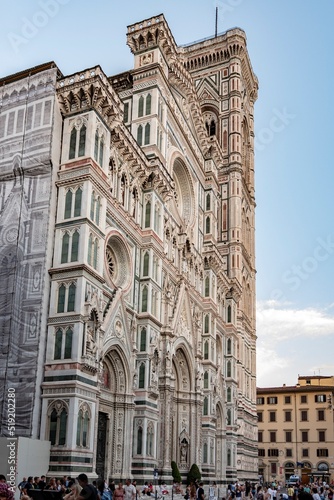 View of the facade of the cathedral of the duomo of Florence and Giotto's bell tower © giadophoto