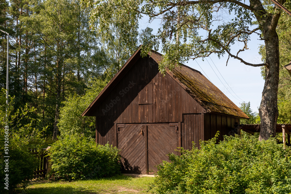 A wooden shed in Melnsils in Latvia A wooden shed in Melnsils in Latvia