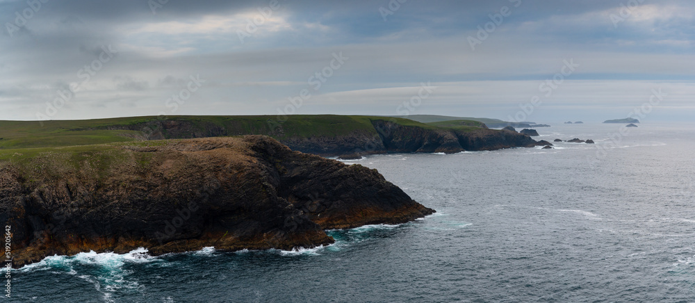 the cliffs and wild coast of Erris Head on the northern tip of the Mullet Peninsula in County Mayo of Ireland the cliffs and wild coast of Erris Head on the northern tip of the Mullet Peninsula in County Mayo of Ireland