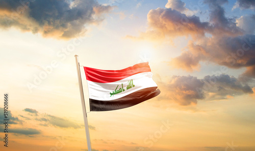 Iraq national flag cloth fabric waving on the sky - Image
