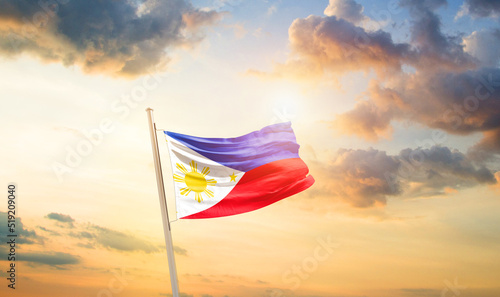 Philippines national flag cloth fabric waving on the sky - Image © Faraz