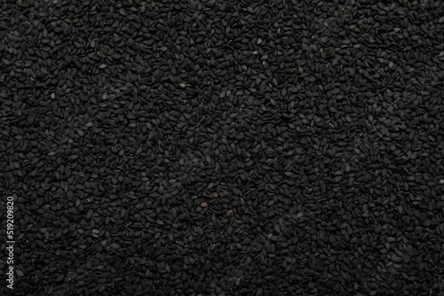Pile of black sesame as background, top view